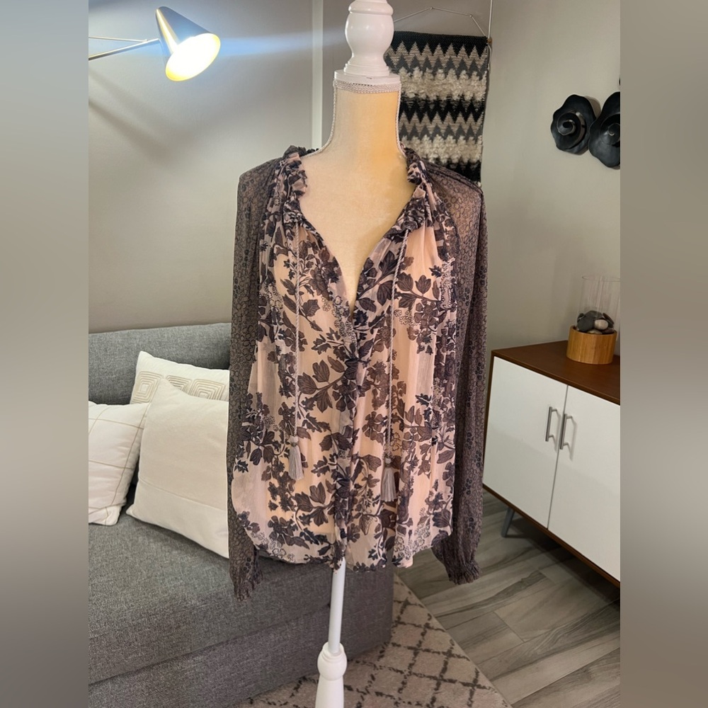 Never worn, Free People multi color blouse.